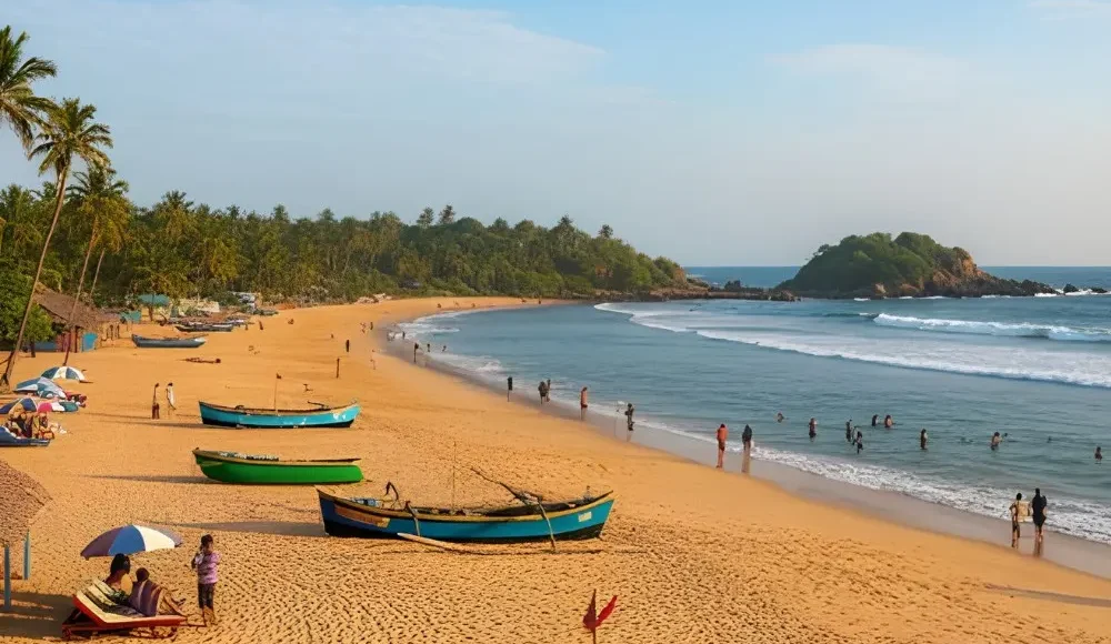 Goa Beaches and Leisure package with golden sand beach, fishing boats, palm trees and scenic coastal holiday views