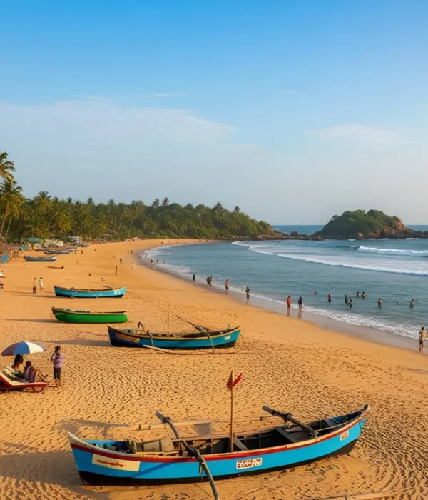 Goa Beaches and Leisure package with golden sand beach, fishing boats, palm trees and scenic coastal holiday views