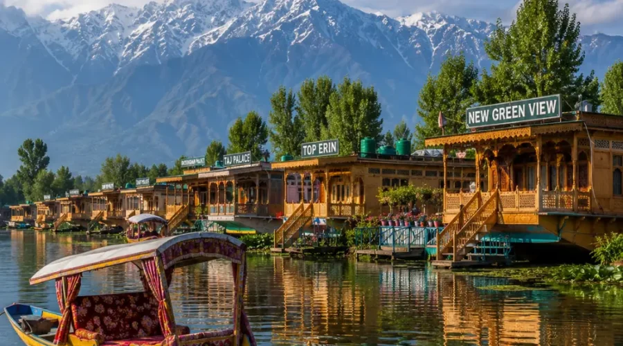 Srinagar houseboat on Dal Lake with calm water, wooden shikara, Himalayan hills and clear morning daylight.
