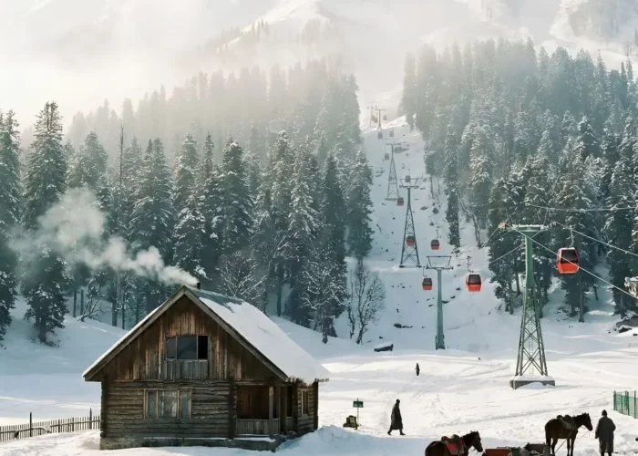 Kashmir Family Delight package with snowy mountains, pine forest, gondola ride, wooden cabin and winter holiday scenery