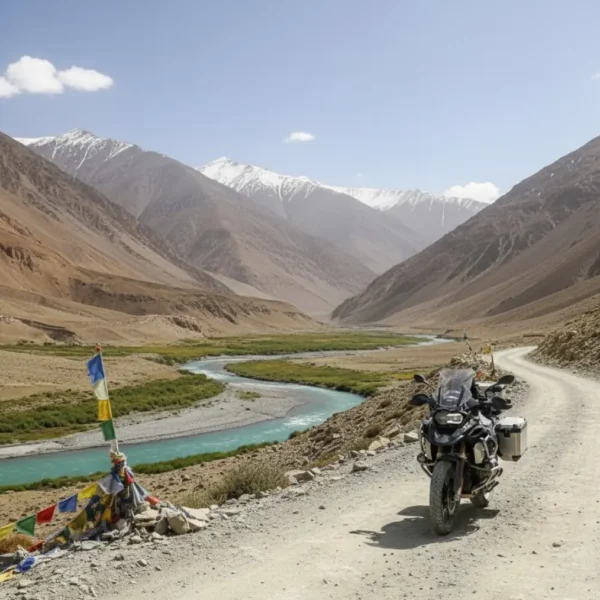Image of a motorcycle on a Ladakh bike tour, with a beautiful valley