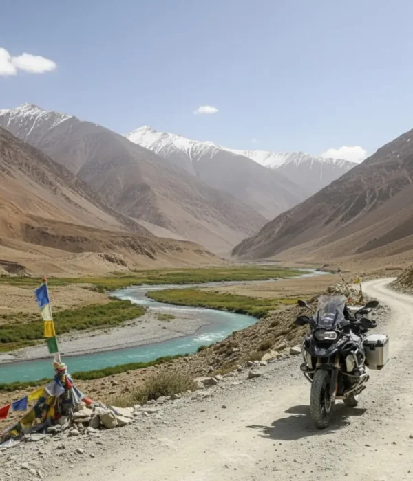 Image of a motorcycle on a Ladakh bike tour, with a beautiful valley