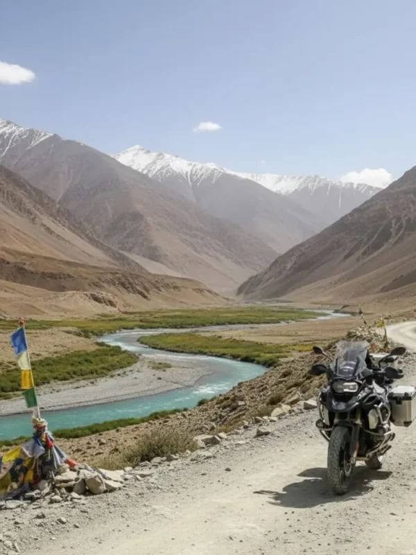 Image of a motorcycle on a Ladakh bike tour, with a beautiful valley