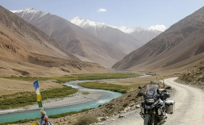 Image of a motorcycle on a Ladakh bike tour, with a beautiful valley