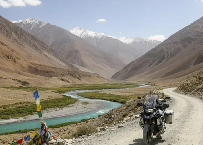 Image of a motorcycle on a Ladakh bike tour, with a beautiful valley