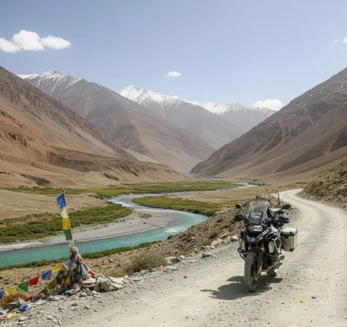 Image of a motorcycle on a Ladakh bike tour, with a beautiful valley