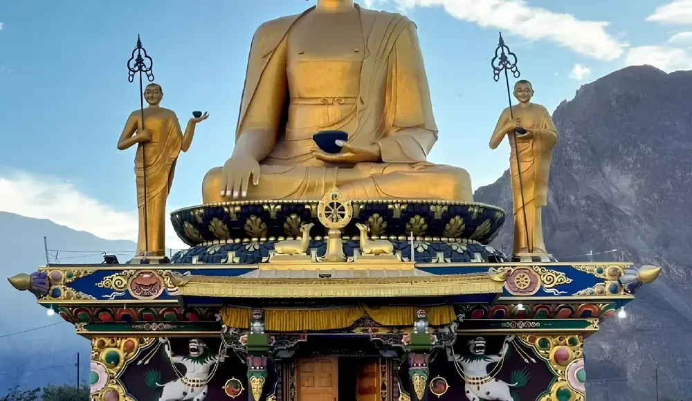 Leh Nubra Valley package with giant Buddha statue, monastery architecture and scenic Ladakh mountain landscape