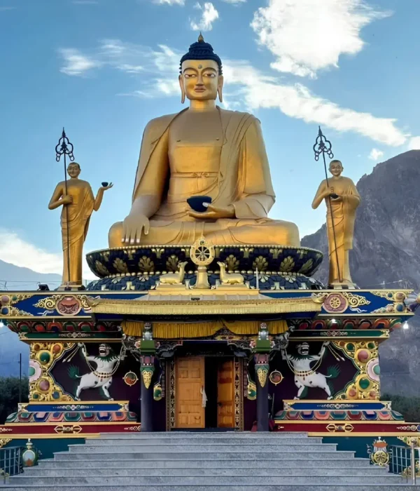 Leh Nubra Valley package with giant Buddha statue, monastery architecture and scenic Ladakh mountain landscape