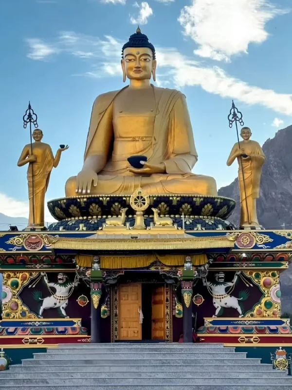 Leh Nubra Valley package with giant Buddha statue, monastery architecture and scenic Ladakh mountain landscape