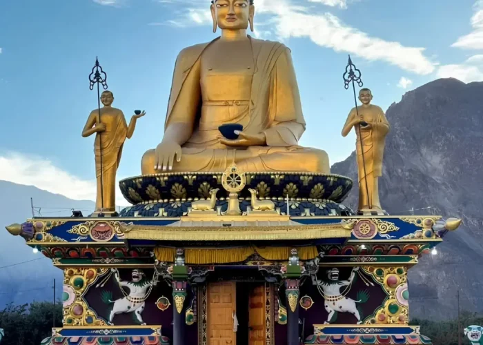 Leh Nubra Valley package with giant Buddha statue, monastery architecture and scenic Ladakh mountain landscape