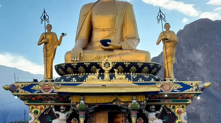 Leh Nubra Valley package with giant Buddha statue, monastery architecture and scenic Ladakh mountain landscape