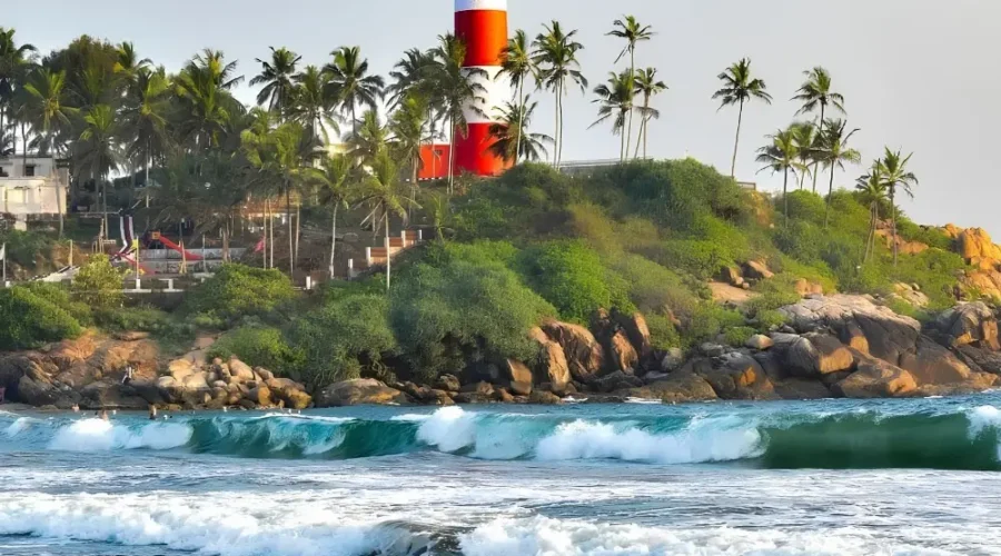Munnar Thekkady Alleppey Kovalam package featuring Kovalam Lighthouse, palm-lined beach, sea waves and Kerala coastal beauty