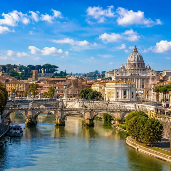 Rome skyline with St. Peter’s Basilica, historic bridge, Tiber River reflections, and warm golden evening light.