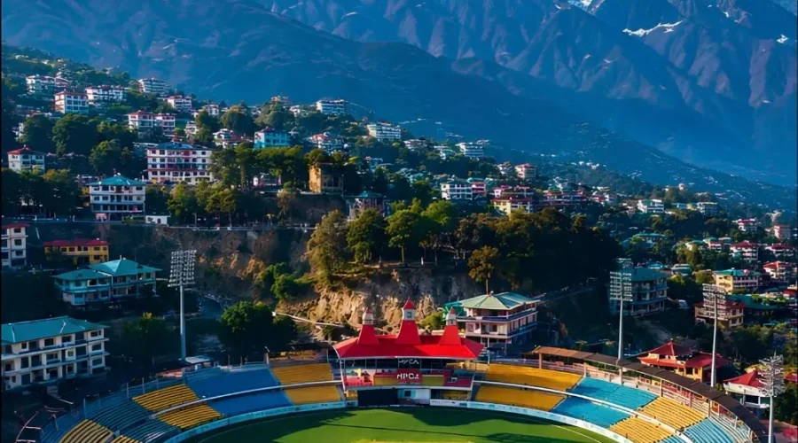 Shimla Manali Dharamshala package with mountain town, cricket stadium and snow covered Dhauladhar range views