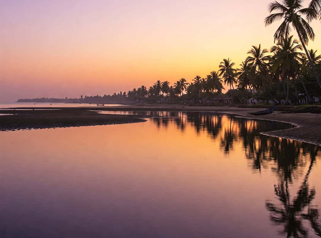 Devbagh Beach’s Golden Sunset and Backwater Serenity