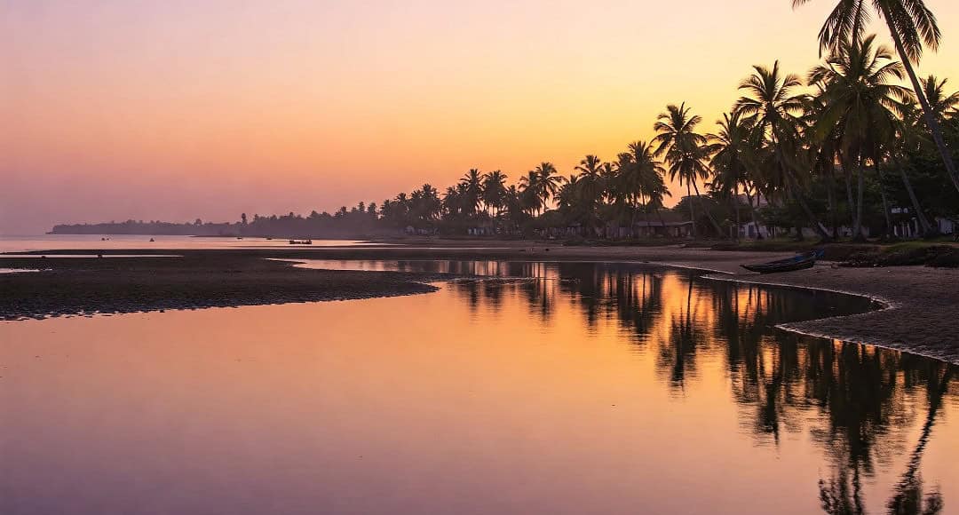 Devbagh Beach’s Golden Sunset and Backwater Serenity