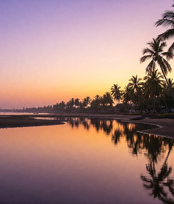 Devbagh Beach’s Golden Sunset and Backwater Serenity