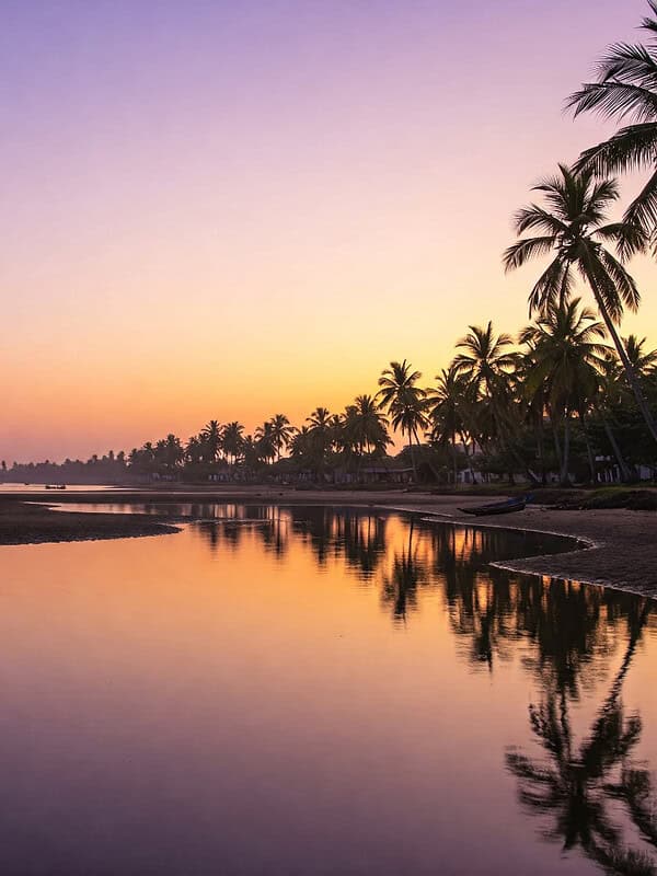 Devbagh Beach’s Golden Sunset and Backwater Serenity