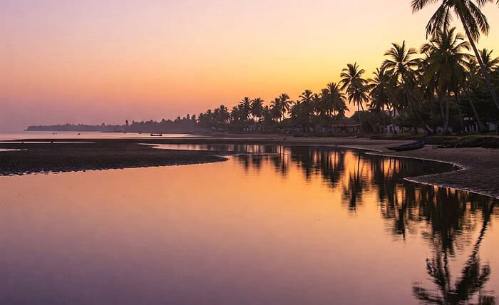 Devbagh Beach’s Golden Sunset and Backwater Serenity