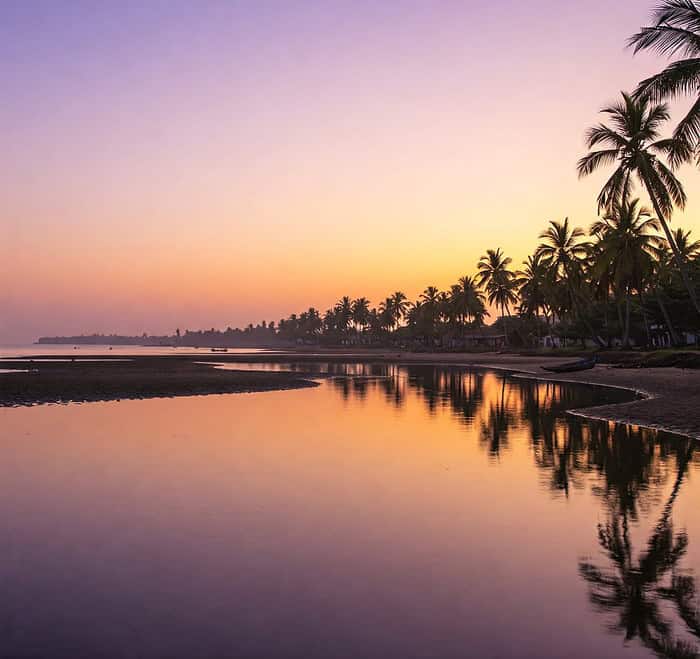 Devbagh Beach’s Golden Sunset and Backwater Serenity