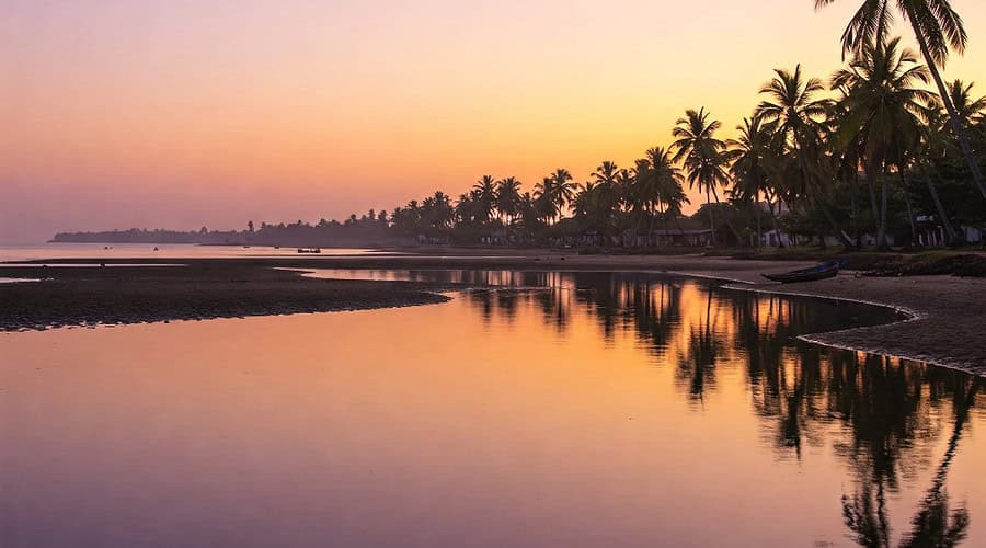 Devbagh Beach’s Golden Sunset and Backwater Serenity