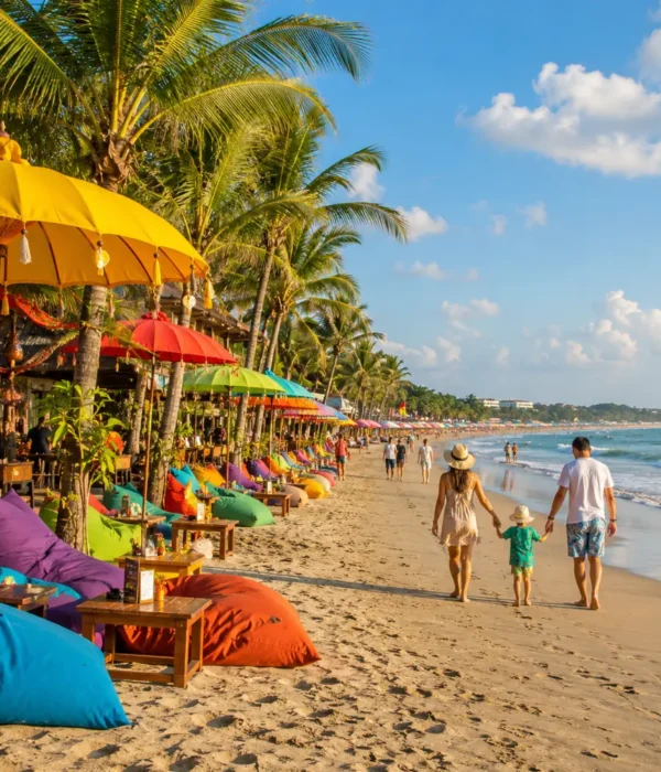 Seminyak Bali family beach tour with luxury resort pool, sandy beach, tropical palms, and bright morning atmosphere.