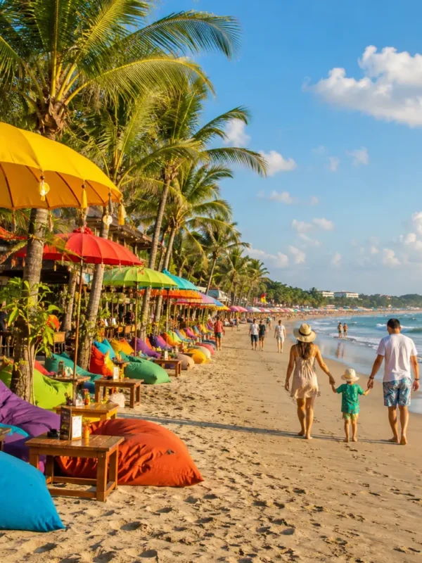 Seminyak Bali family beach tour with luxury resort pool, sandy beach, tropical palms, and bright morning atmosphere.