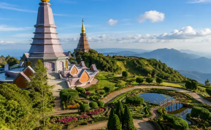 Chiang Mai Thailand with mountain temple, lush green hills, golden pagoda, and bright morning cultural atmosphere.