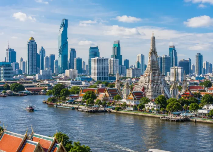 Bangkok city skyline with Grand Palace, Chao Phraya River, modern towers, and bright morning Thai atmosphere.