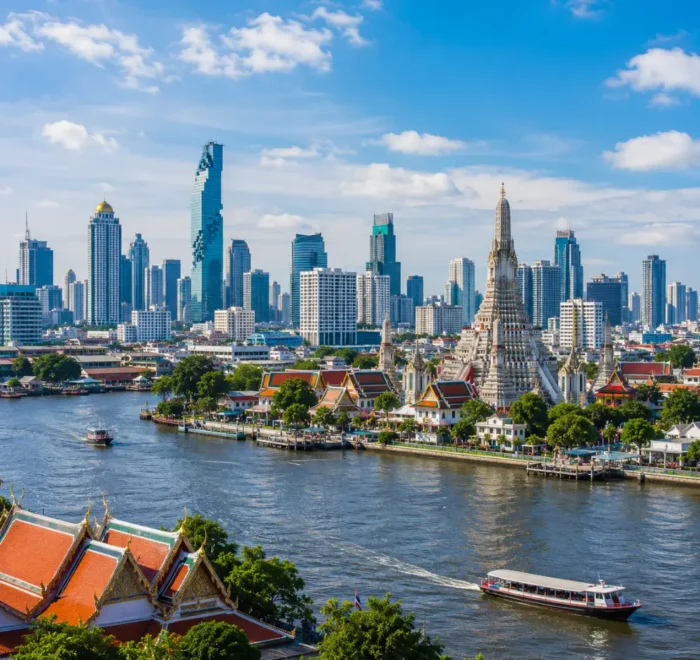 Bangkok city skyline with Grand Palace, Chao Phraya River, modern towers, and bright morning Thai atmosphere.