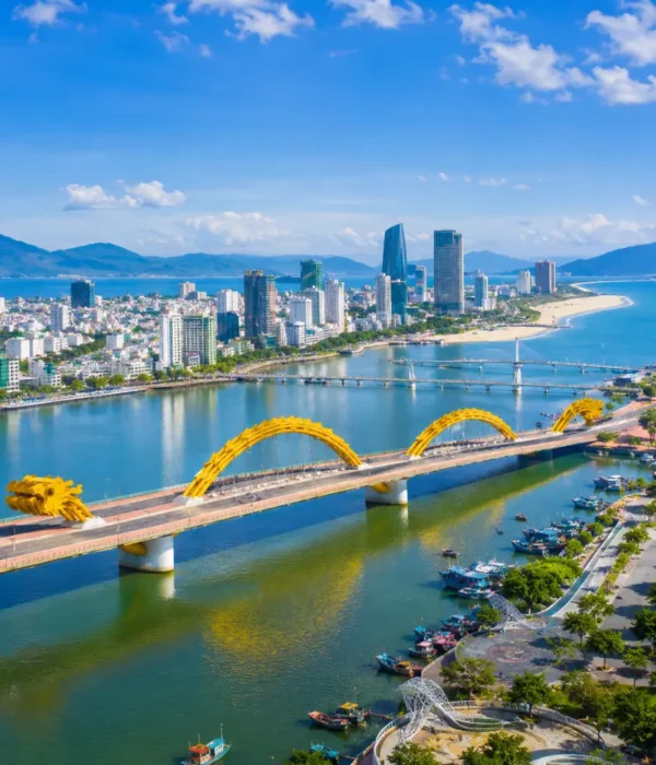 Da Nang Vietnam with Golden Bridge, lush Ba Na Hills scenery, and a bright premium luxury travel atmosphere.