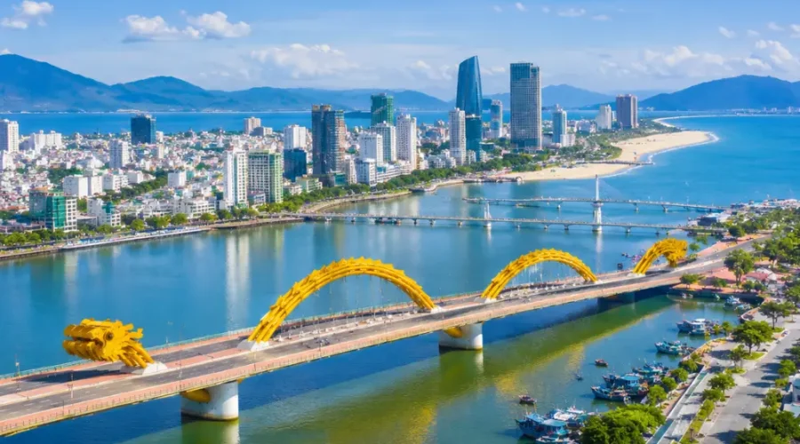 Da Nang Vietnam with Golden Bridge, lush Ba Na Hills scenery, and a bright premium luxury travel atmosphere.