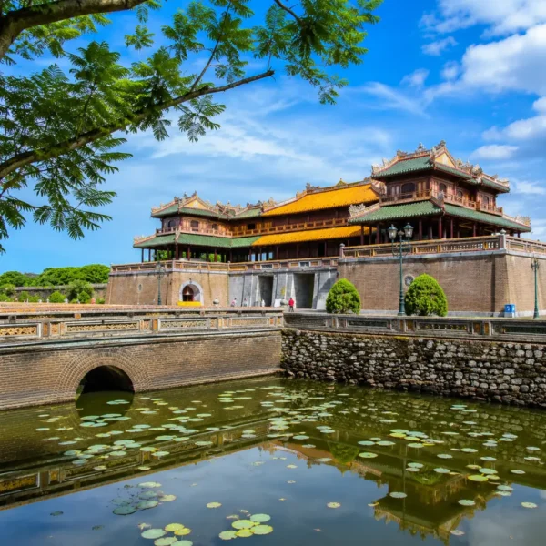 Hue Vietnam Imperial City with ancient royal architecture, lotus ponds, and a premium cultural travel atmosphere.
