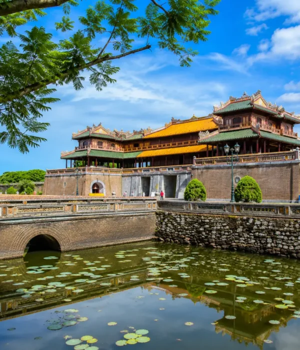 Hue Vietnam Imperial City with ancient royal architecture, lotus ponds, and a premium cultural travel atmosphere.