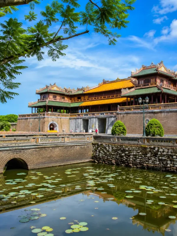 Hue Vietnam Imperial City with ancient royal architecture, lotus ponds, and a premium cultural travel atmosphere.