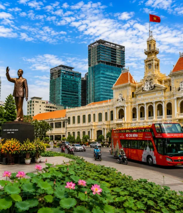 Ho Chi Minh City tour with City Hall, Ho Chi Minh statue, lotus garden, sightseeing bus, and modern Saigon skyline.