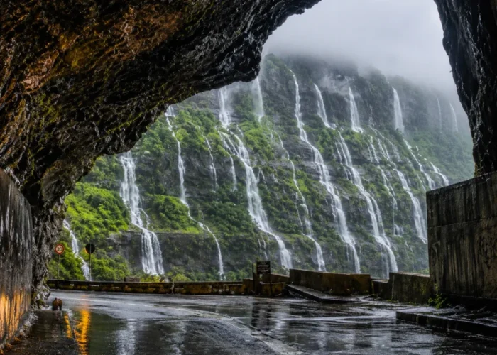 Malshej Ghat monsoon tour featuring mist-covered Sahyadri hills, lush green valleys and cascading seasonal waterfalls