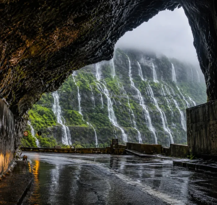 Malshej Ghat monsoon tour featuring mist-covered Sahyadri hills, lush green valleys and cascading seasonal waterfalls