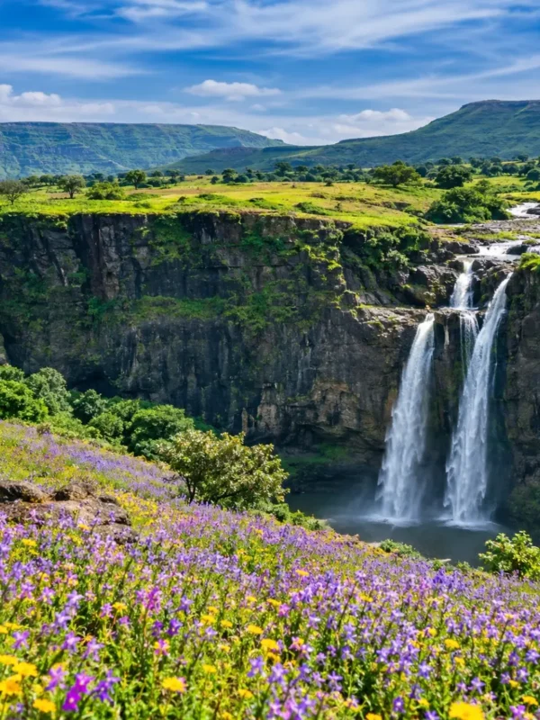 Satara Kaas Plateau Thoseghar Tour Package featuring Kaas Plateau, Thoseghar Waterfalls, Kaas Lake, Sajjangad Fort and the scenic Sahyadri hills.