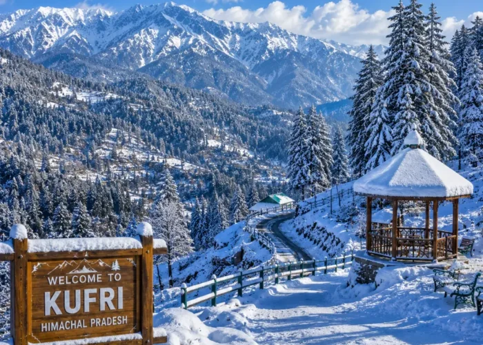 Kufri hill station with pine forests, snowy Himalayan views, green slopes and clear morning mountain scenery near Shimla.