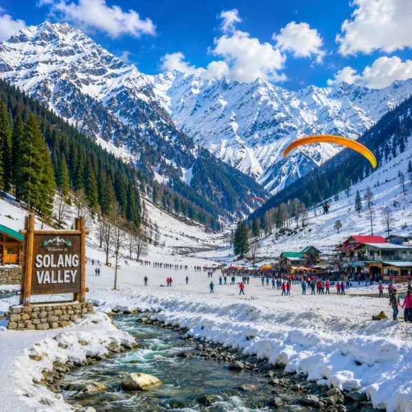 Solang Valley with snow-capped mountains, green meadows, pine forests and clear morning adventure scenery in Manali.