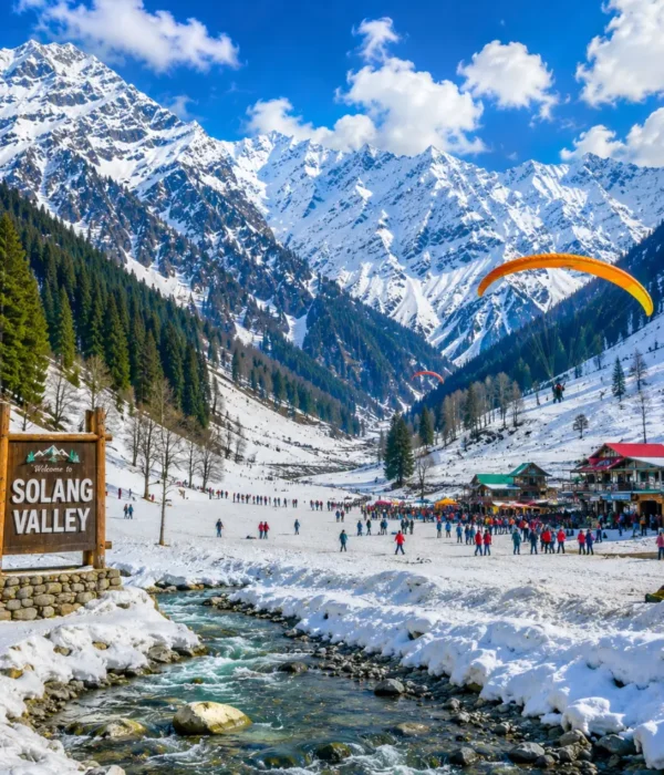 Solang Valley with snow-capped mountains, green meadows, pine forests and clear morning adventure scenery in Manali.