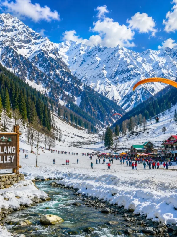 Solang Valley with snow-capped mountains, green meadows, pine forests and clear morning adventure scenery in Manali.