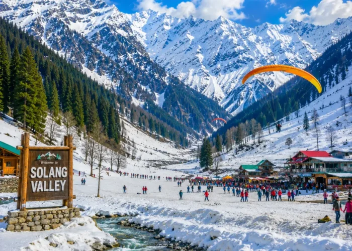 Solang Valley with snow-capped mountains, green meadows, pine forests and clear morning adventure scenery in Manali.