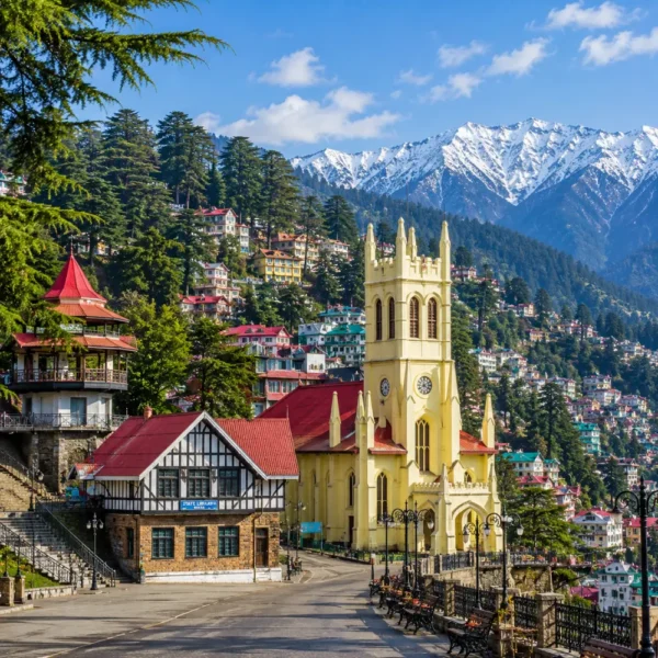 Shimla hill station with colonial buildings, pine forests, Mall Road charm and Himalayan hills in clear morning light.