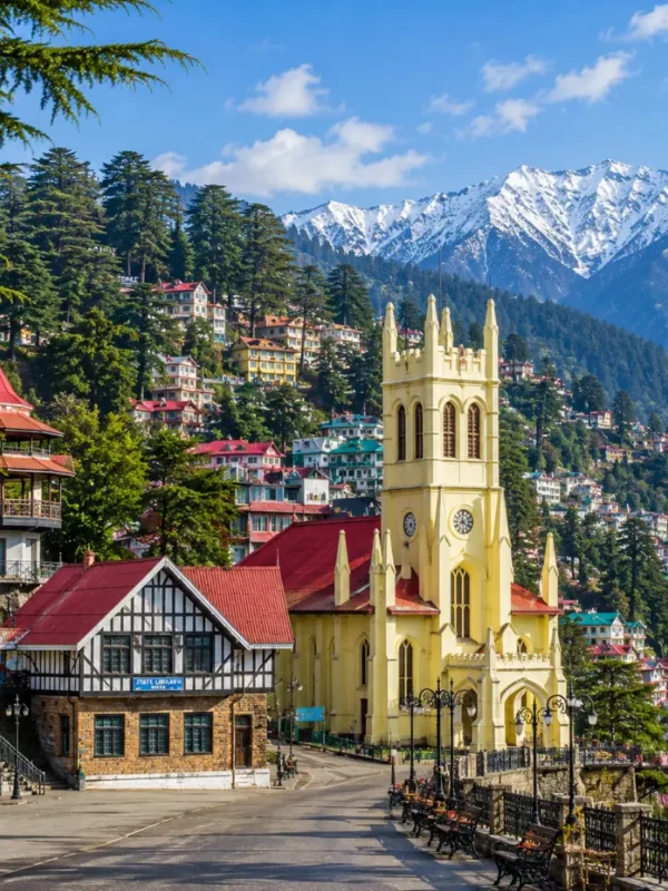 Shimla hill station with colonial buildings, pine forests, Mall Road charm and Himalayan hills in clear morning light.