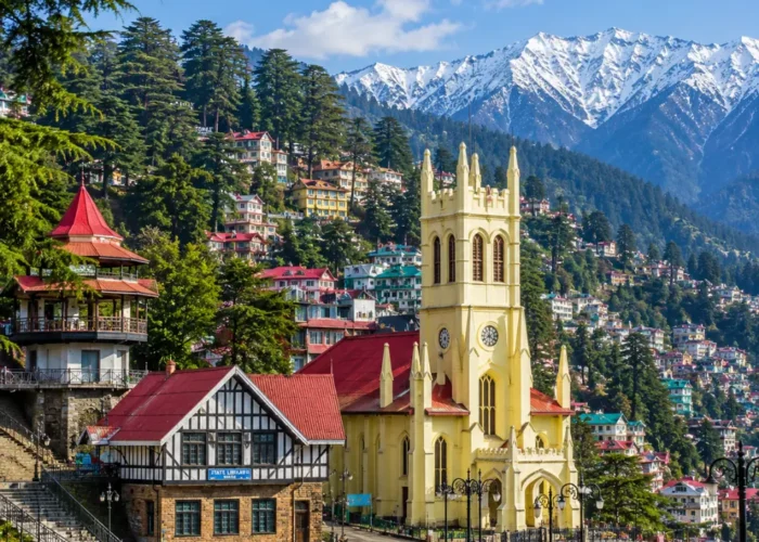 Shimla hill station with colonial buildings, pine forests, Mall Road charm and Himalayan hills in clear morning light.
