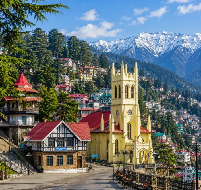 Shimla hill station with colonial buildings, pine forests, Mall Road charm and Himalayan hills in clear morning light.