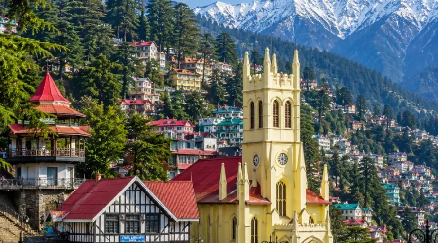 Shimla hill station with colonial buildings, pine forests, Mall Road charm and Himalayan hills in clear morning light.