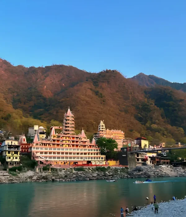 Grand Uttarakhand Explorer tour with riverfront town, mountain backdrop, scenic hills and peaceful Uttarakhand landscape